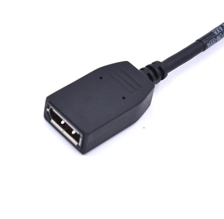 Close-up view of a black USB adapter connector, highlighting its design and build quality.