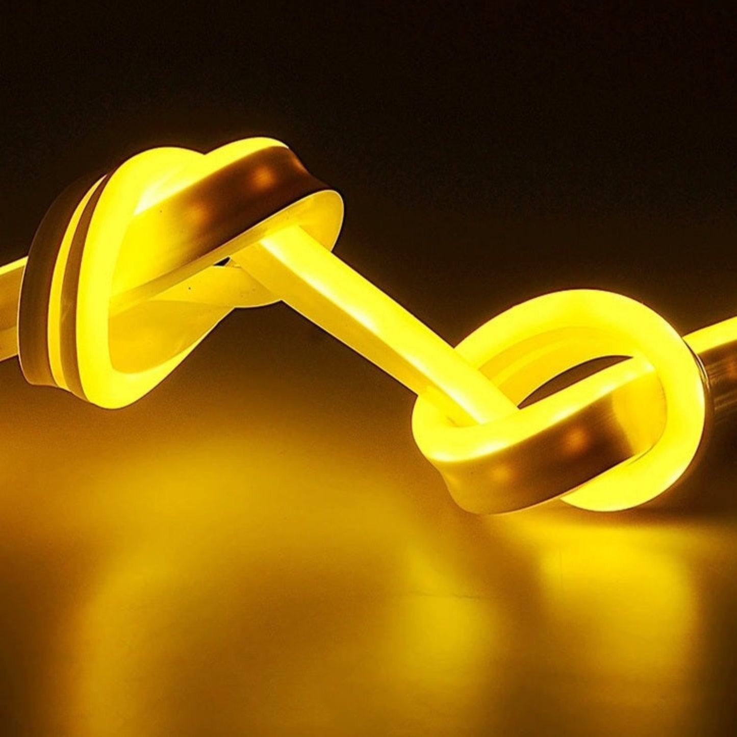 Close-up of the yellow flexible LED neon strip, demonstrating its bendable and knot-friendly design.