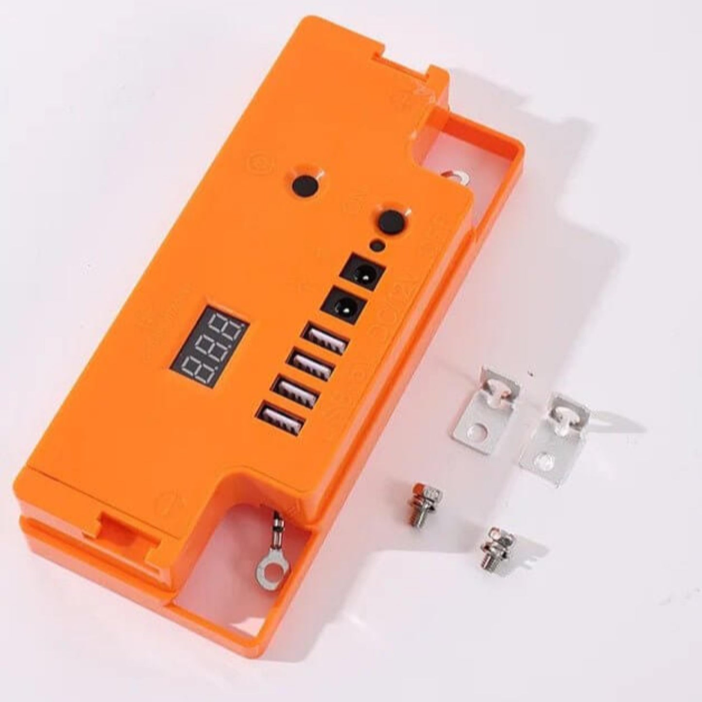 Orange portable battery power bank case with digital display and mounting accessories for 12V batteries.