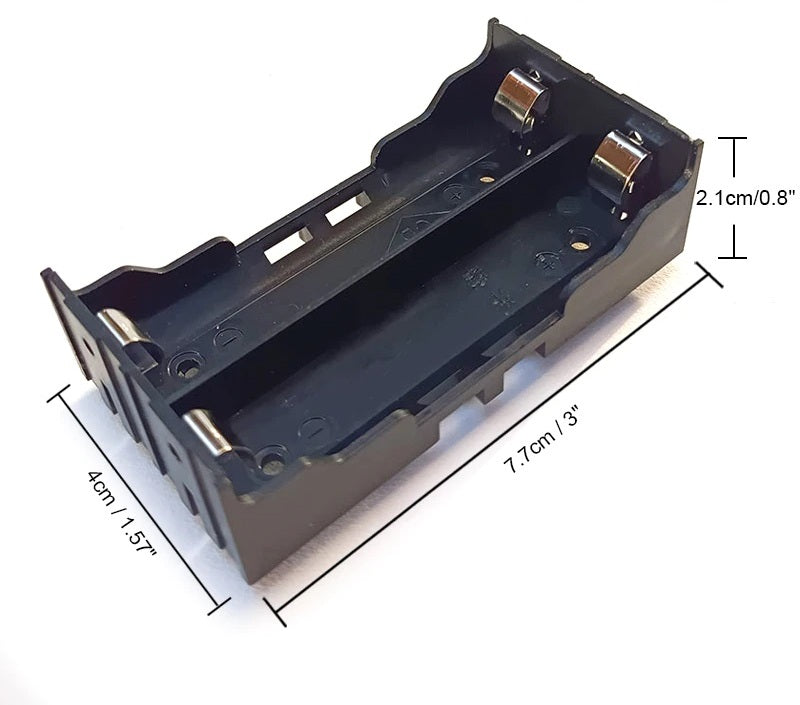 Angled view of a 2-slot 18650 battery holder displaying length, width, and height dimensions in cm and inches.