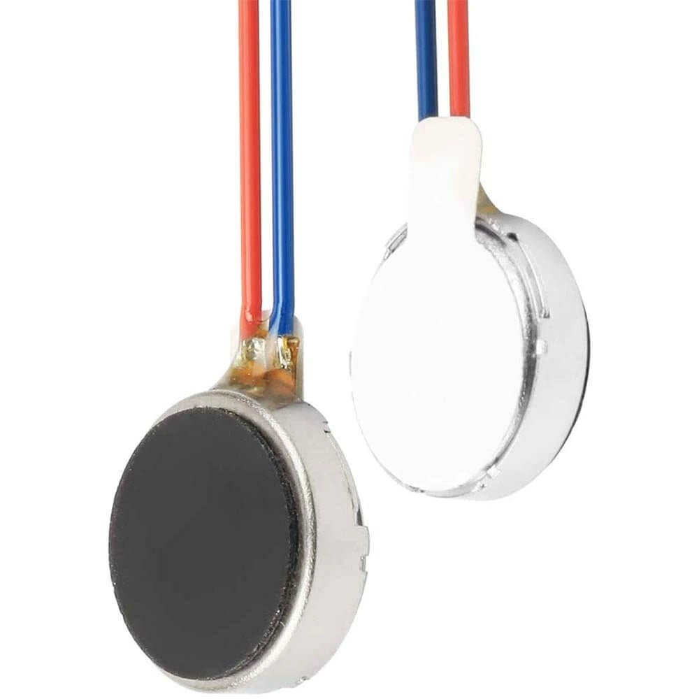 Close-up of 3.7V mini vibration motors with red and blue wires, ideal for mobile phones and electronic devices.