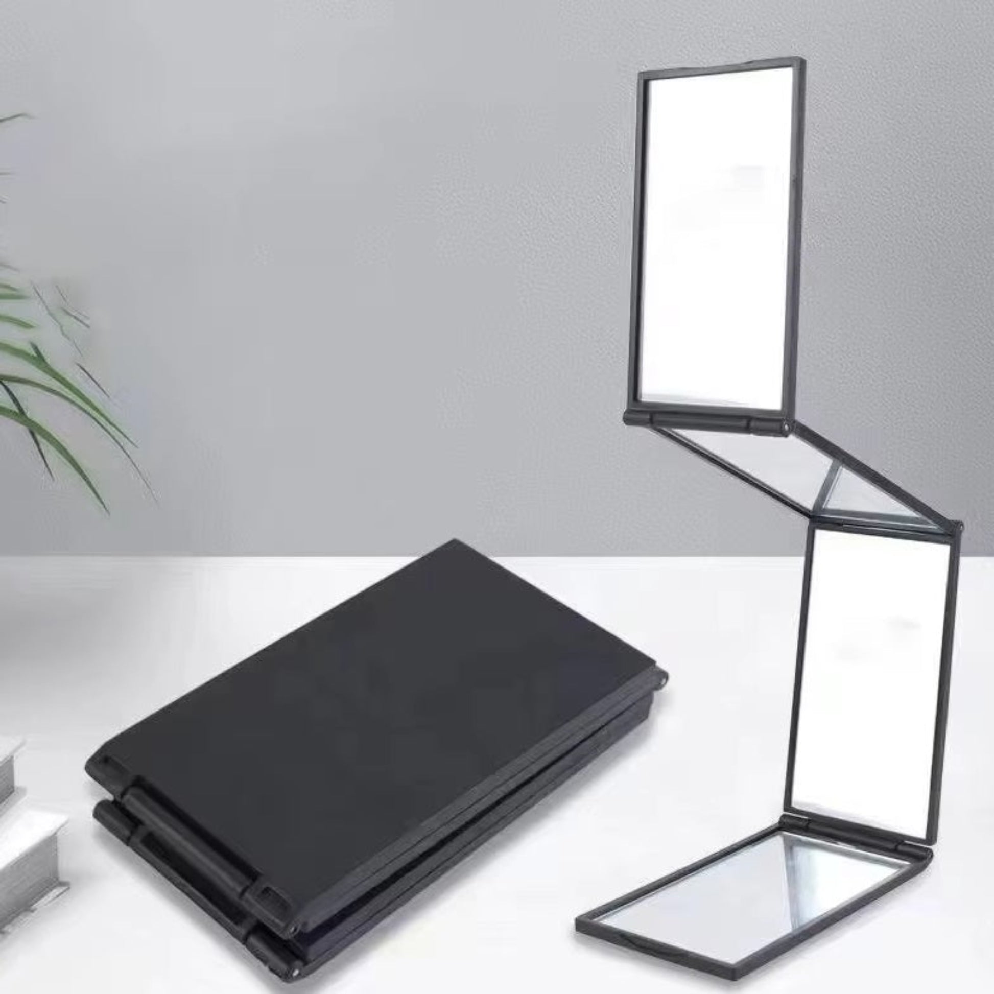 4-Way 360° Folding Mirror displayed open and closed, ideal for hair and makeup styling with high-definition panels.