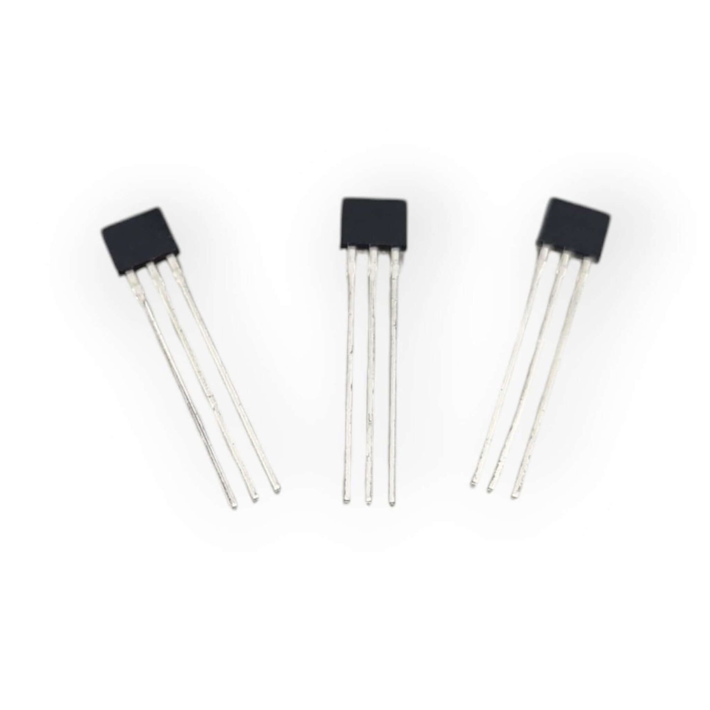 Three 49E linear Hall effect sensors, black rectangular package, showcasing pin configuration for automation control.