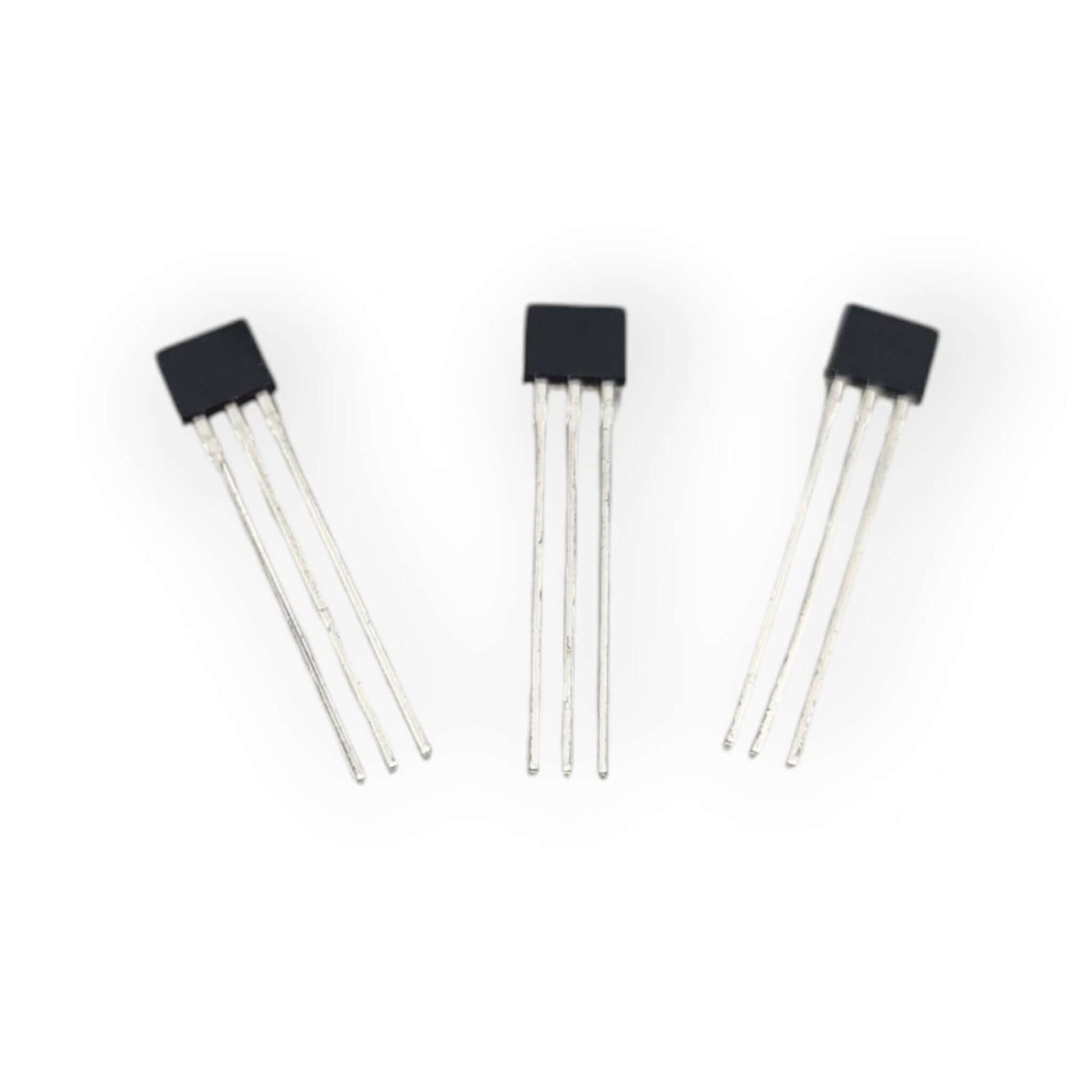 Three 49E linear Hall effect sensors, black rectangular package, showcasing pin configuration for automation control.