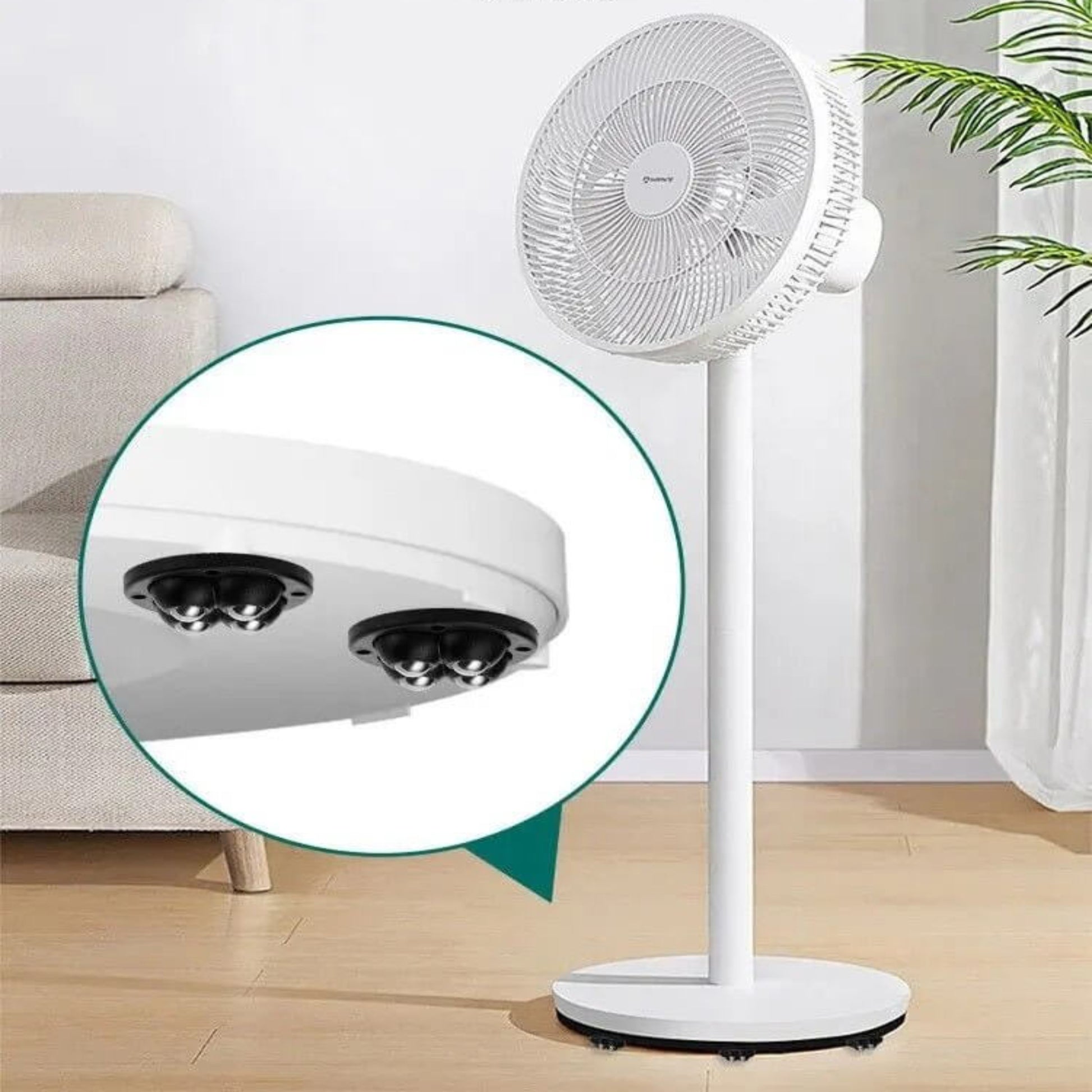 Self-adhesive ball wheels attached to the base of a standing fan, showing integrated design for smooth, effortless movement.