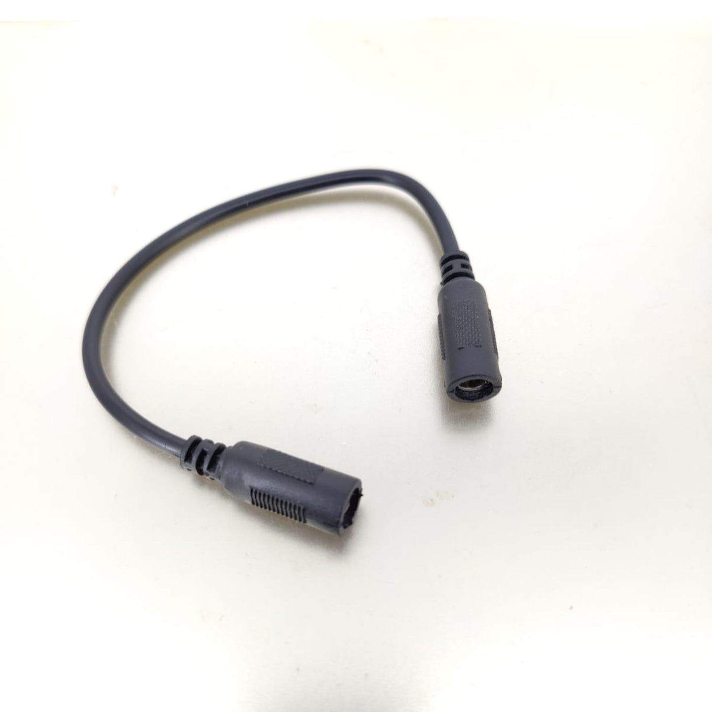 DC power cable adapter, 5.5x2.1mm female to female extension, 18cm length, reliable connection for electronic devices.