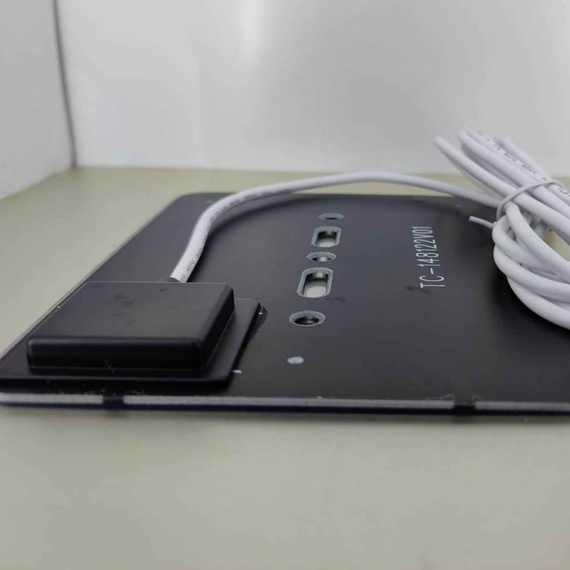 Compact 5V 1.5W mini solar panel charger with Type-C output and charging cable.