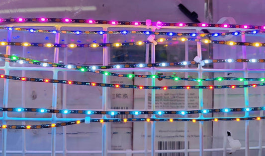 Colorful 5V USB 0805 LED strip lights displayed on a grid, showcasing vibrant illumination for versatile lighting.