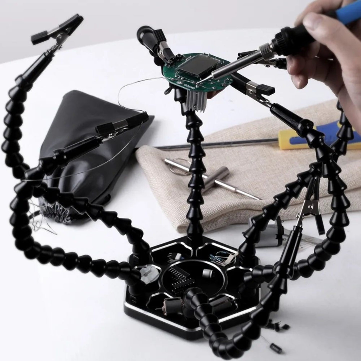 6 arm soldering station with LED assisting in PCB work, featuring flexible arms for precise soldering and hobbies.