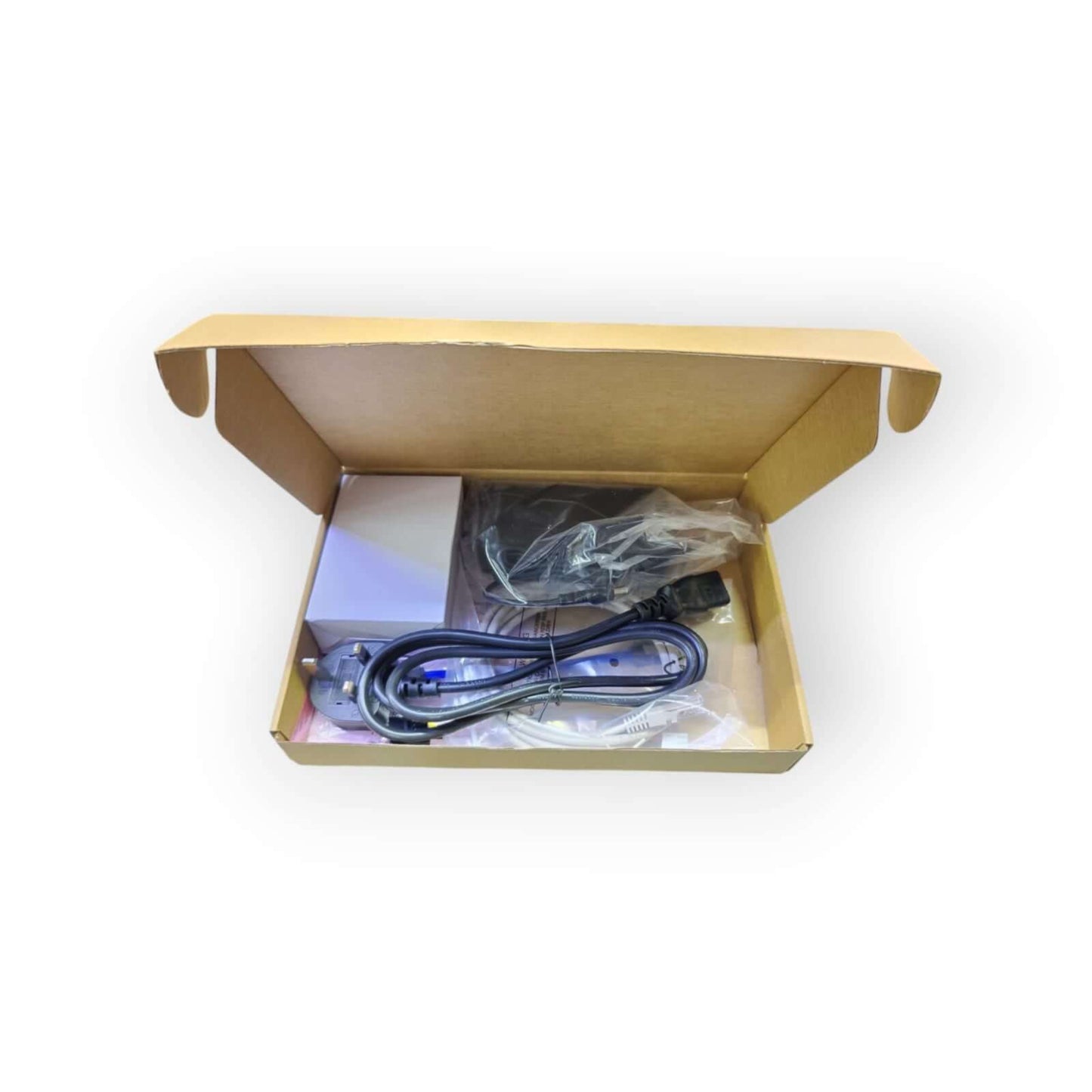 Open box displaying the Dahua NVR4104HS-P-4KS3 components including cables and accessories.