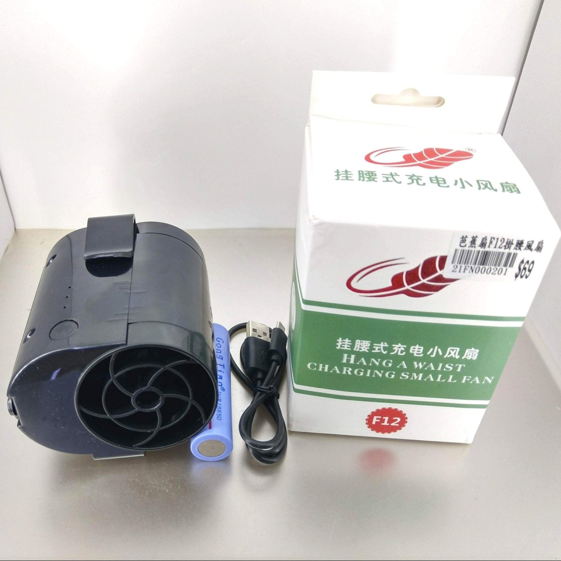 F12 portable waist clip fan with USB charging cable and box, ideal for hands-free cooling.