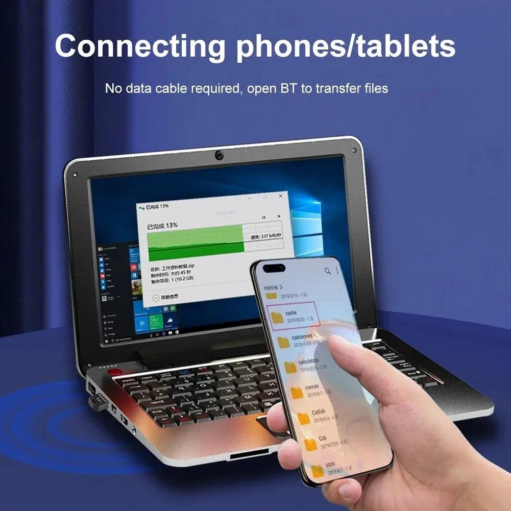 Wireless USB Bluetooth dongle connecting phone to laptop for file transfer without cables.