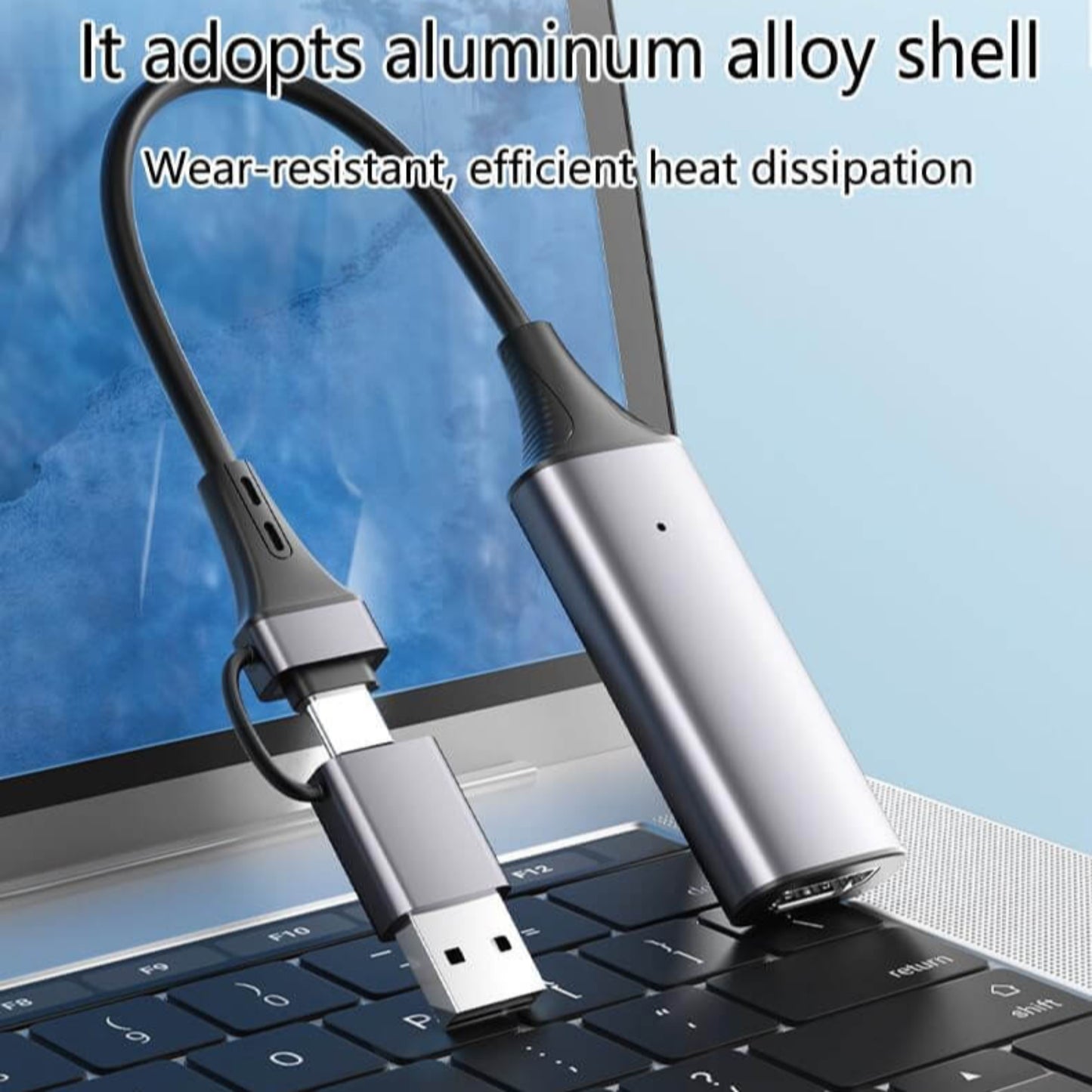 Video capture card with aluminum alloy shell connected to laptop USB port for efficient heat dissipation.
