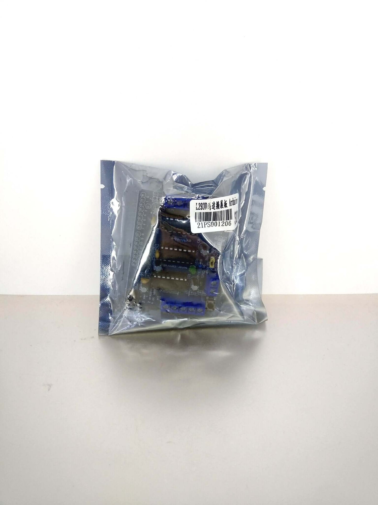 L293D Motor Driver Shield for Arduino in packaging, ideal for controlling motors in electronic projects.