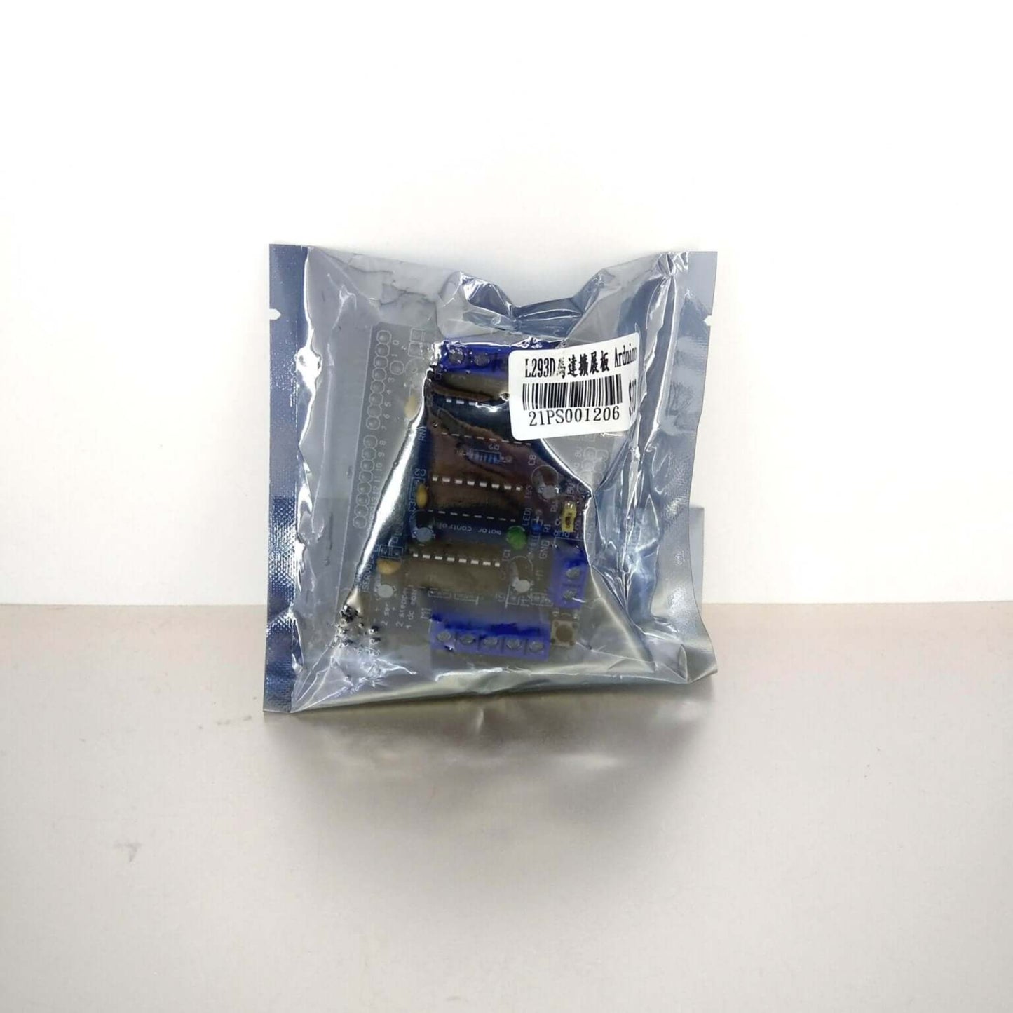 L293D Motor Driver Shield for Arduino in packaging, ideal for controlling motors in electronic projects.