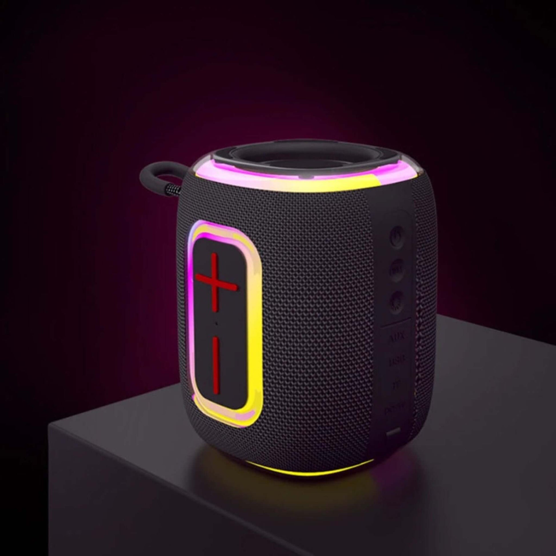 Side view of black Bluetooth speaker showing covered ports for USB, TF card, AUX, and Type-C charging.