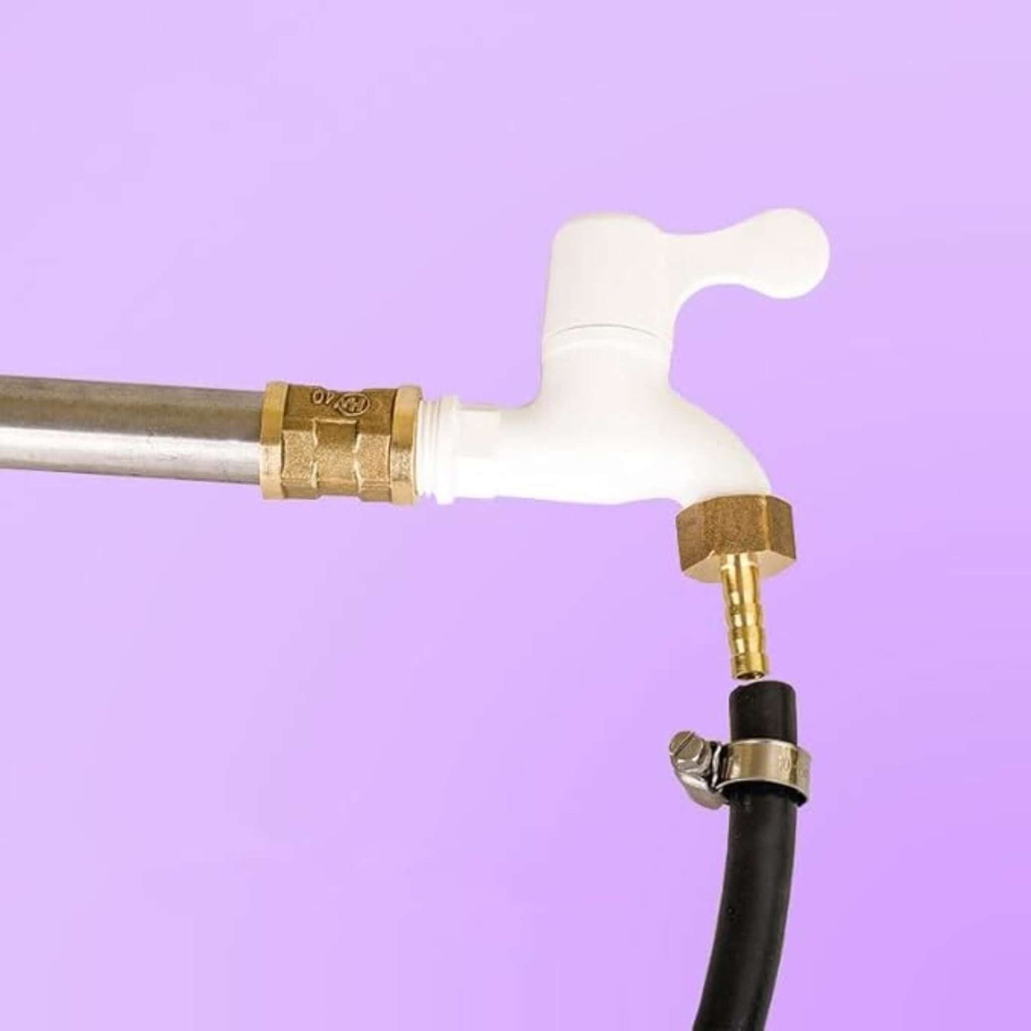 Brass hose adapter connecting to a black hose and white faucet for secure water flow.
