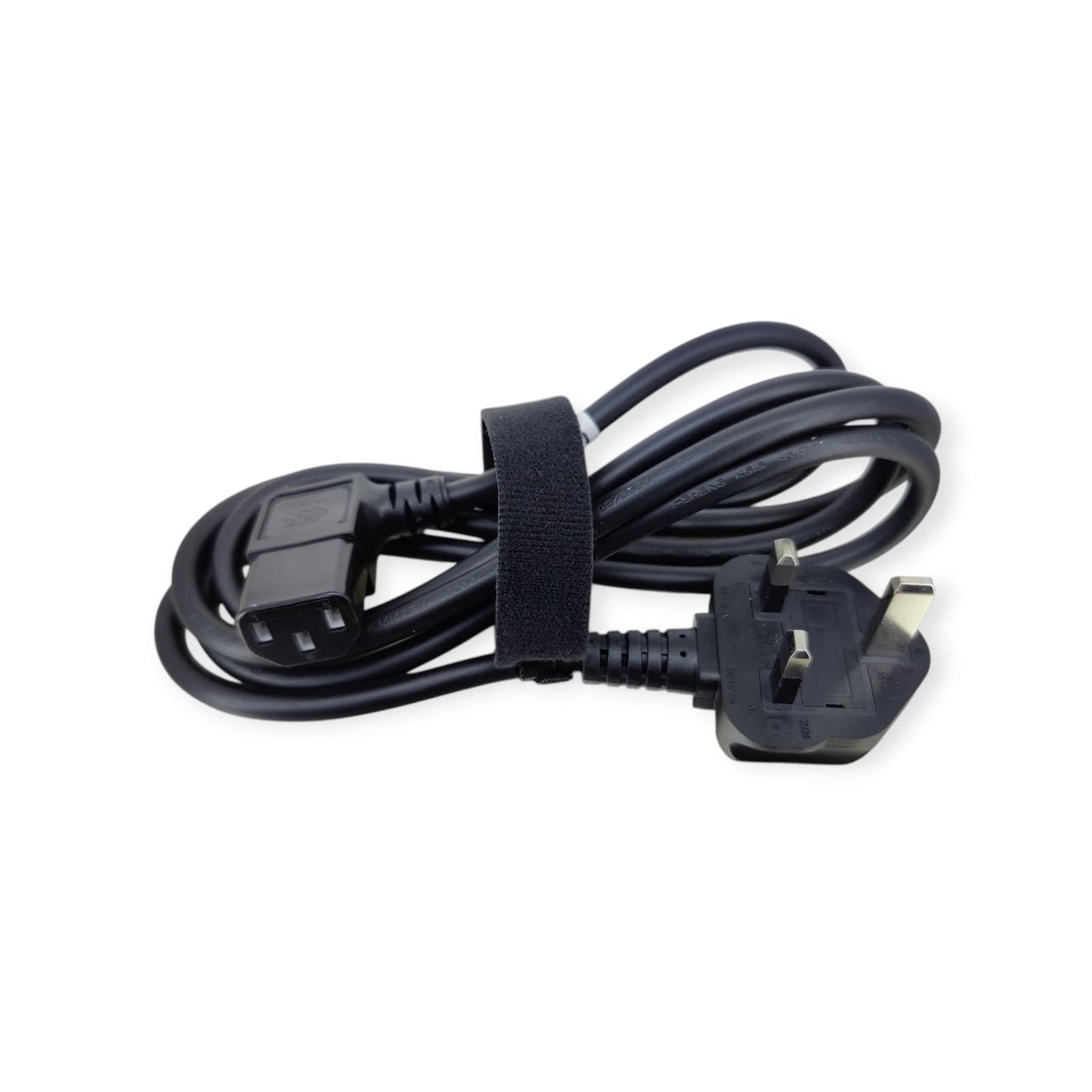 A close-up view of a black 10A 250V power cord with a standard UK 3-pin plug and an IEC C13 connector, neatly bundled.
