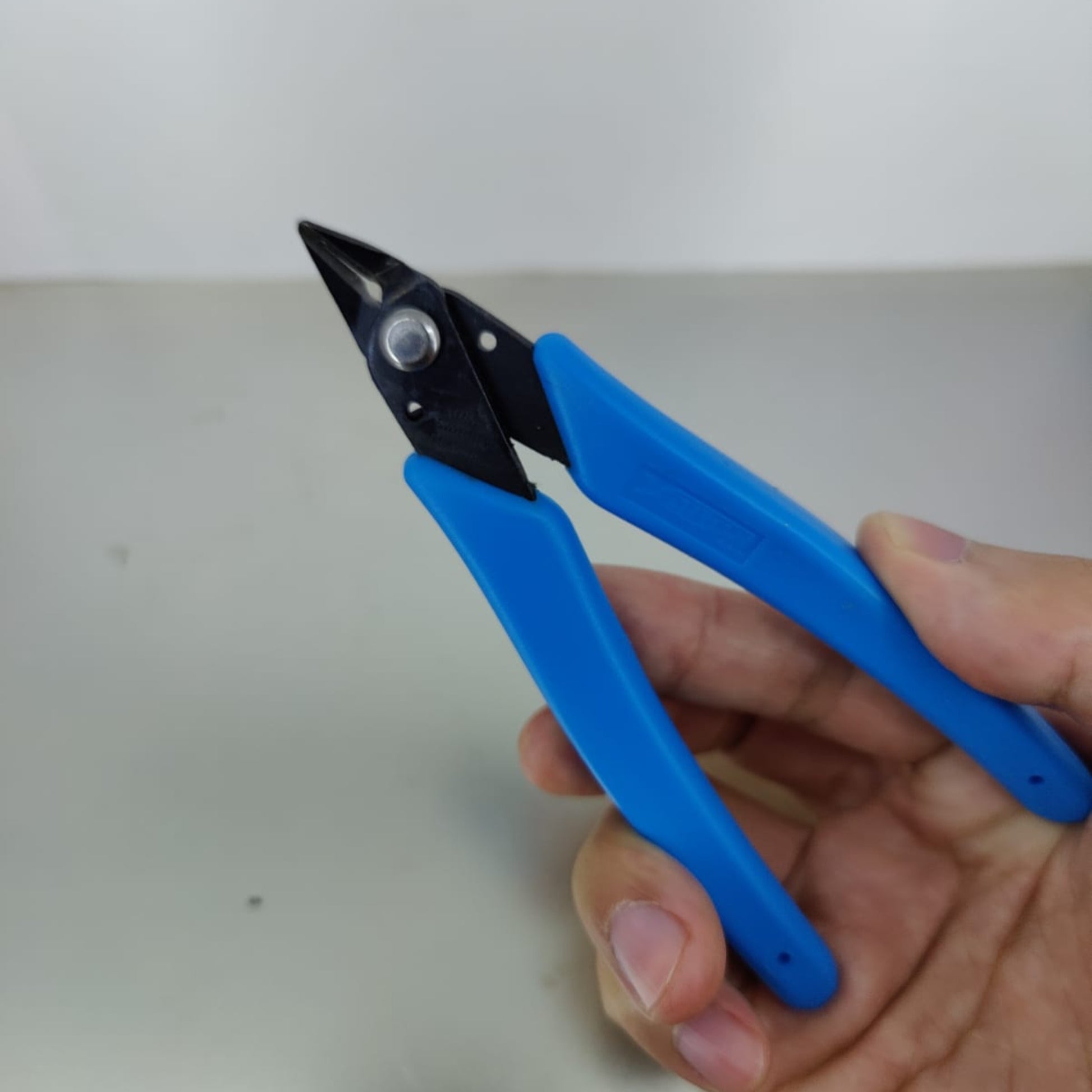 5 inch precision wire cutter with blue handles for jewelry making and electronics work
