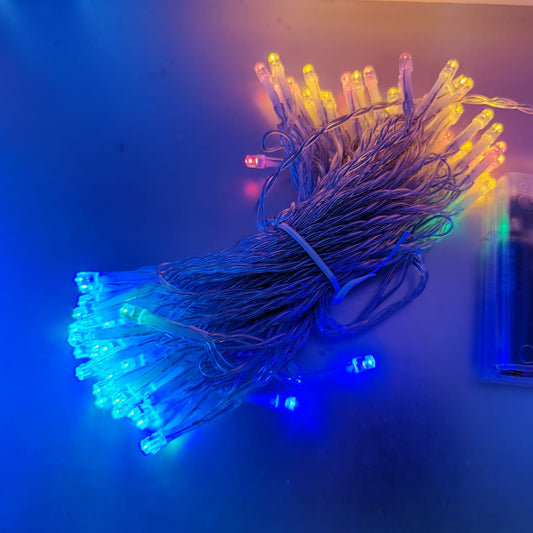 AA battery-operated LED string lights in various colors, perfect for indoor and outdoor holiday decorations.