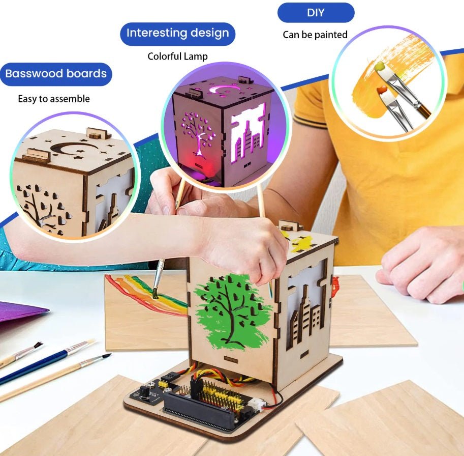 Colorful DIY light box kit on a table, featuring basswood boards, easy assembly, and painting options for creative expression.