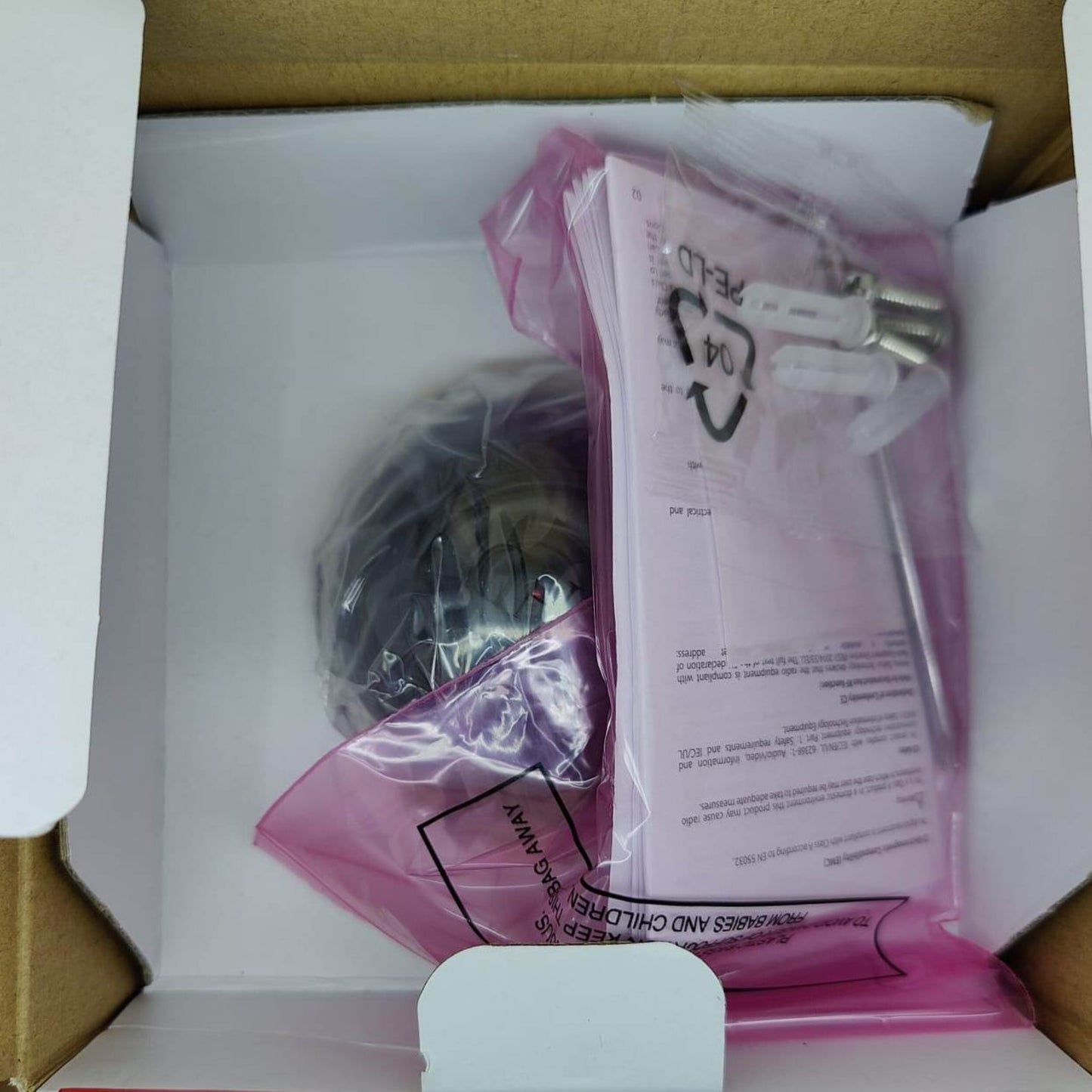 Contents of the Dahua HDCVI camera box, including mounting hardware and installation manual.