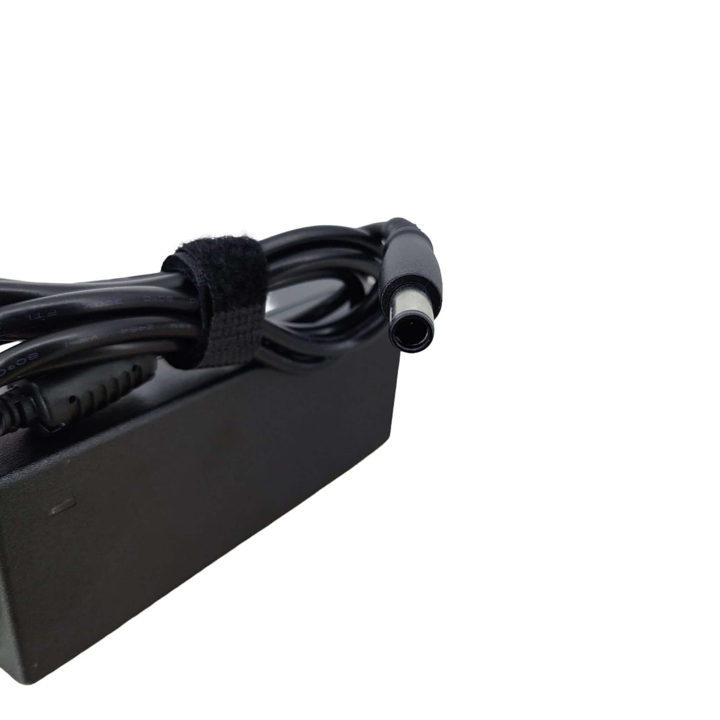 Close-up of Dell 90W AC adapter's 7.4mm x 5.0mm barrel connector, perfect for compatible Dell laptops.