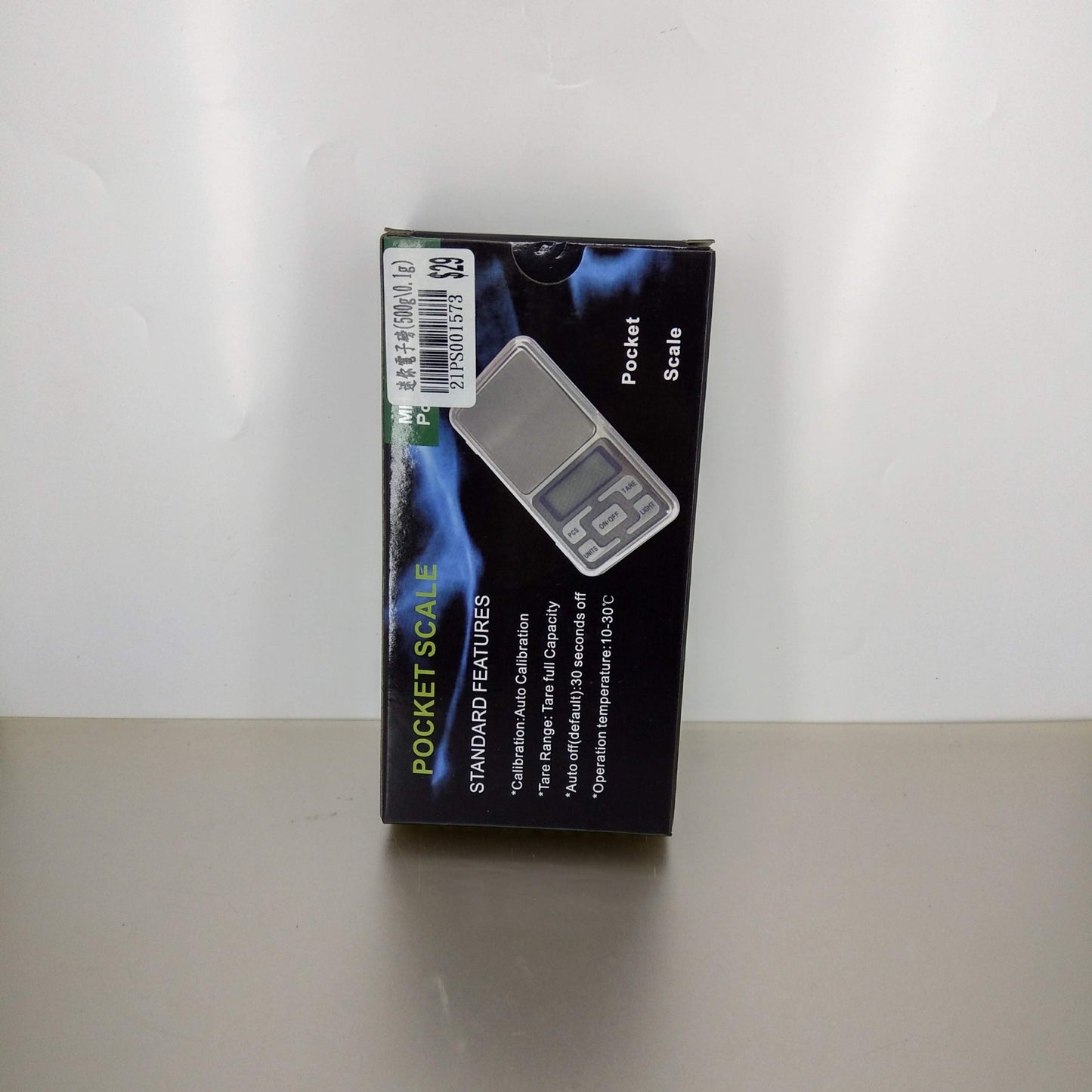 Black and green box for the MH-Series Pocket Scale, showing its features.