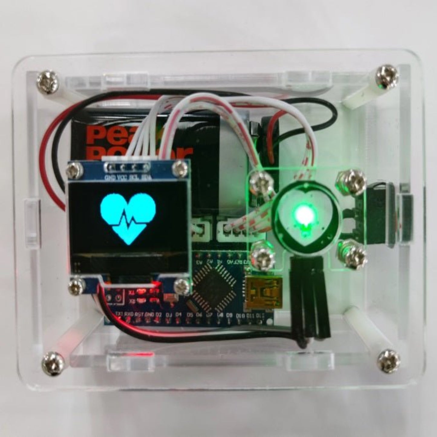 Heart rate monitoring module for Arduino with LED display and pulse sensor in clear casing.