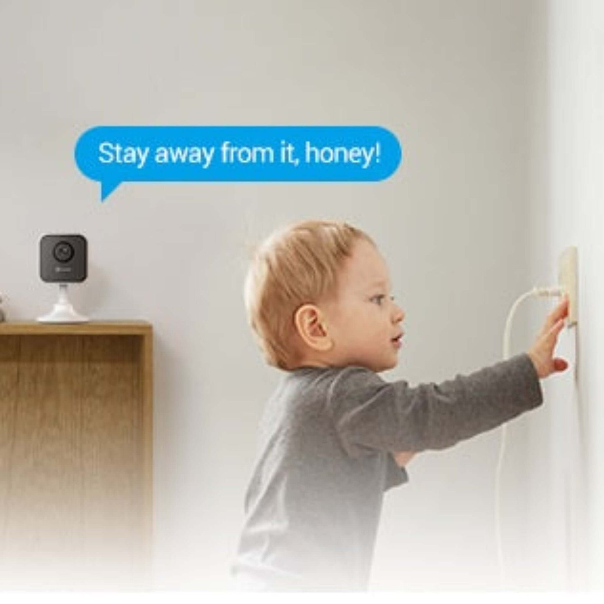 EZVIZ H1c camera monitoring a child, demonstrating the two-way talk feature for home safety.
