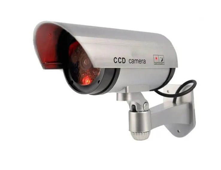 Realistic dummy security camera with flashing LED light for home and business protection against theft and vandalism.