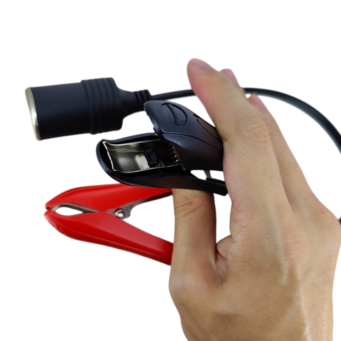 Close-up of the red and black insulated alligator clips designed for secure attachment to car battery terminals.