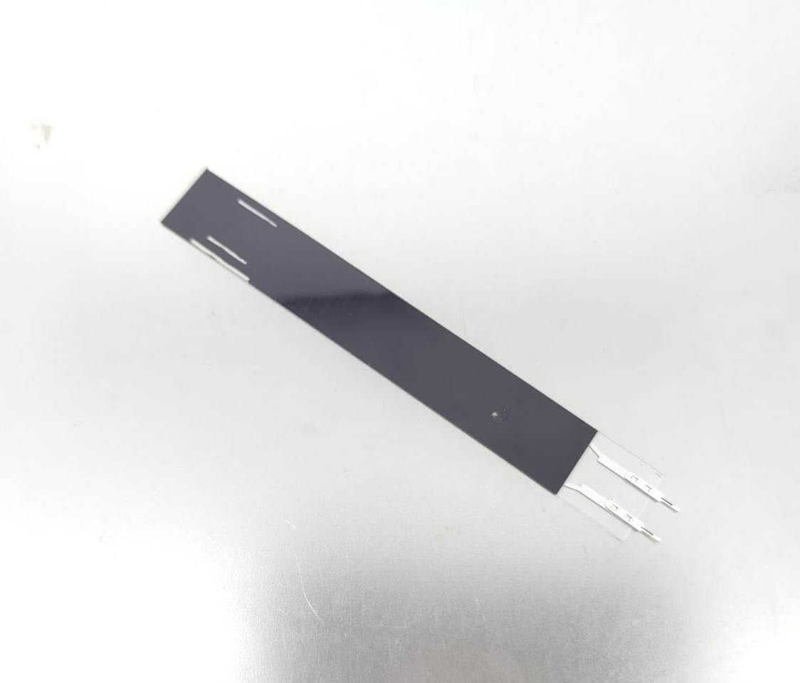 Resistive thin film pressure sensor module for precise force detection in electronics and robotics.