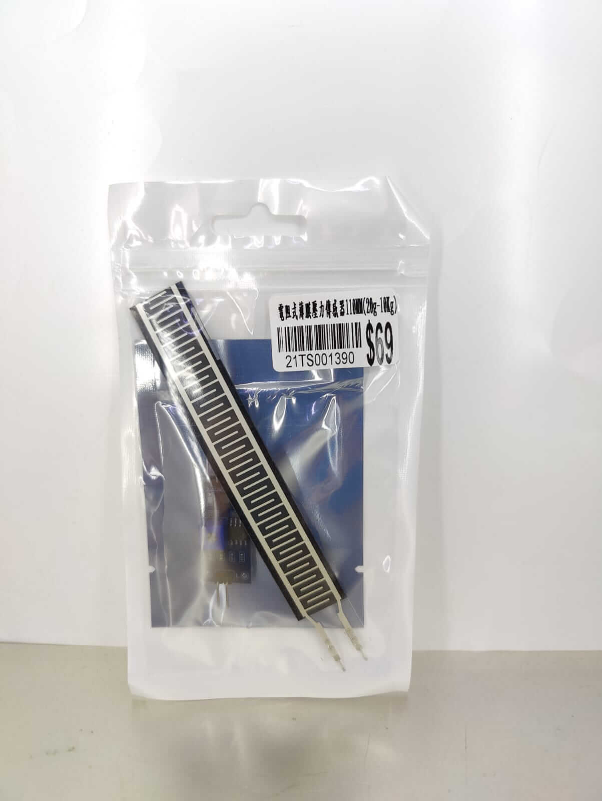 Resistive Thin Film Pressure Sensor (FSR) 110mm kit with amplifier module in packaging.