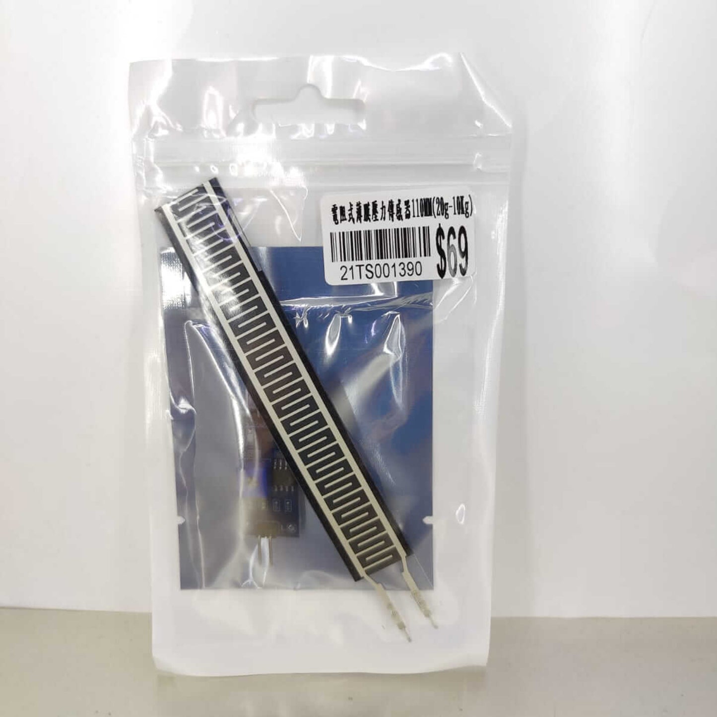 Resistive Thin Film Pressure Sensor (FSR) 110mm kit with amplifier module in packaging.