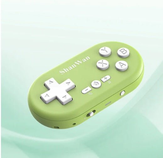 Green wireless Bluetooth pocket game controller with buttons for gaming on PC, Android, and iOS.