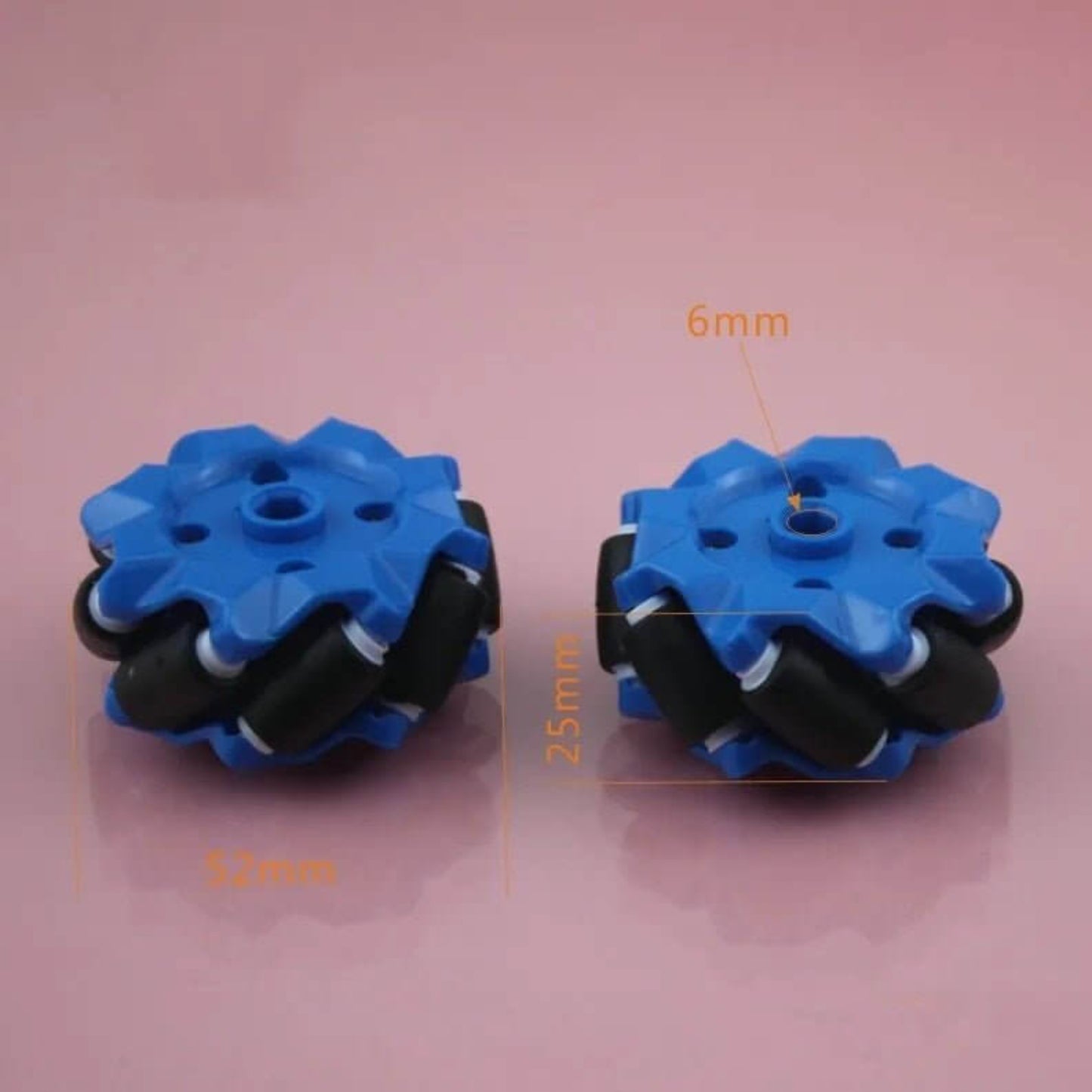 Two 52mm blue Mecanum wheels showing 6mm mounting hole and 25mm diameter.