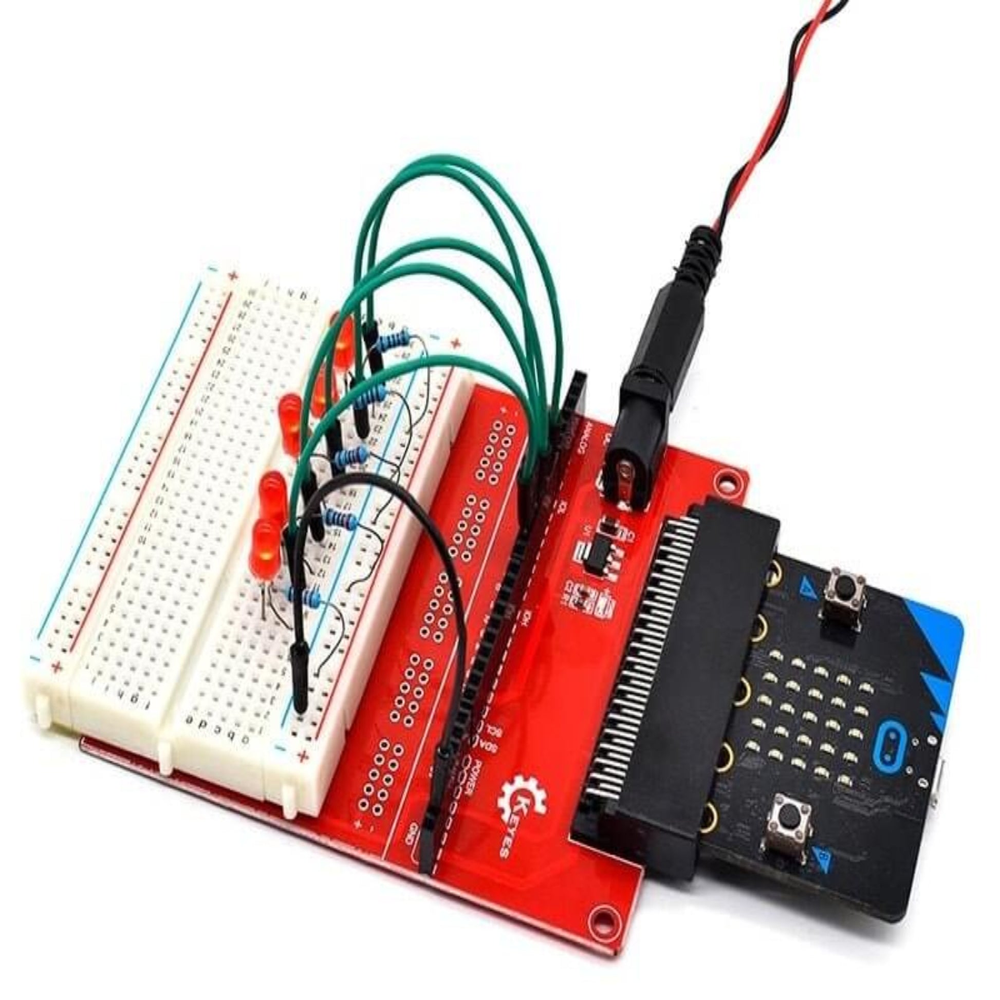 Micro:bit extension board connected to a breadboard with LEDs and wiring for DIY electronic projects.