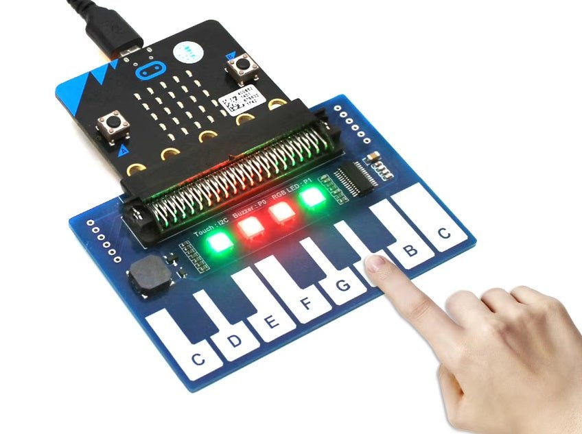 Mini Piano Module for Micro:bit showcasing touch keys and RGB LEDs in use.