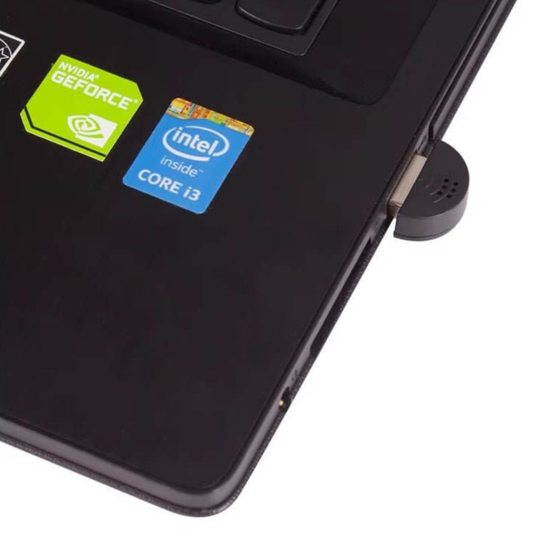 Close-up of a laptop showing NVIDIA GeForce and Intel Core i3 stickers on the surface.