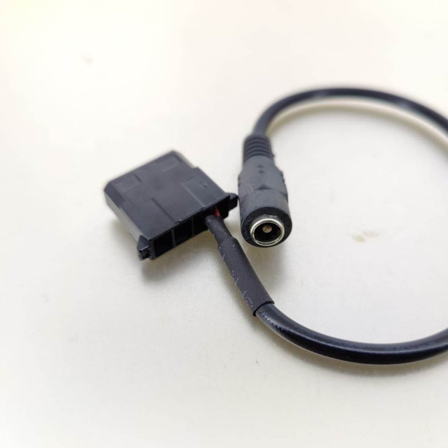 Side view of 4-pin Molex to DC female power adapter cable, highlighting the female DC 5.5x2.1mm barrel connector.