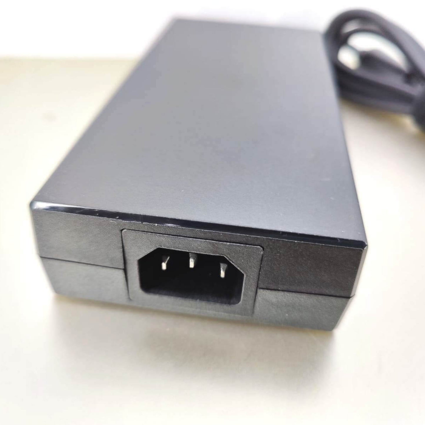 MSI laptop charger 230W, 19.5V 11.8A, featuring the AC power input port for connection.
