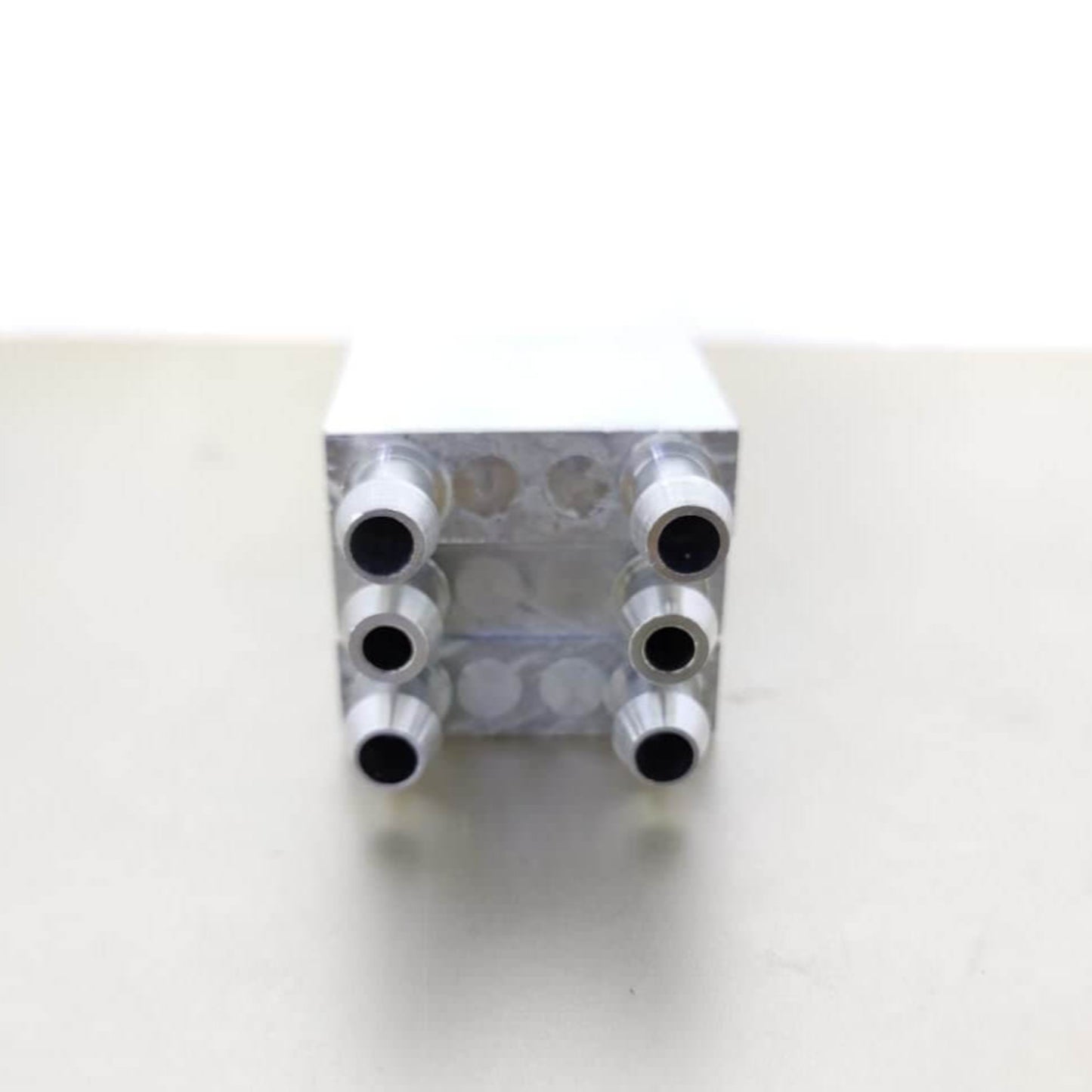 Aluminum water cooling block with multiple ports for CPU, GPU, and industrial applications, providing efficient heat dissipation.