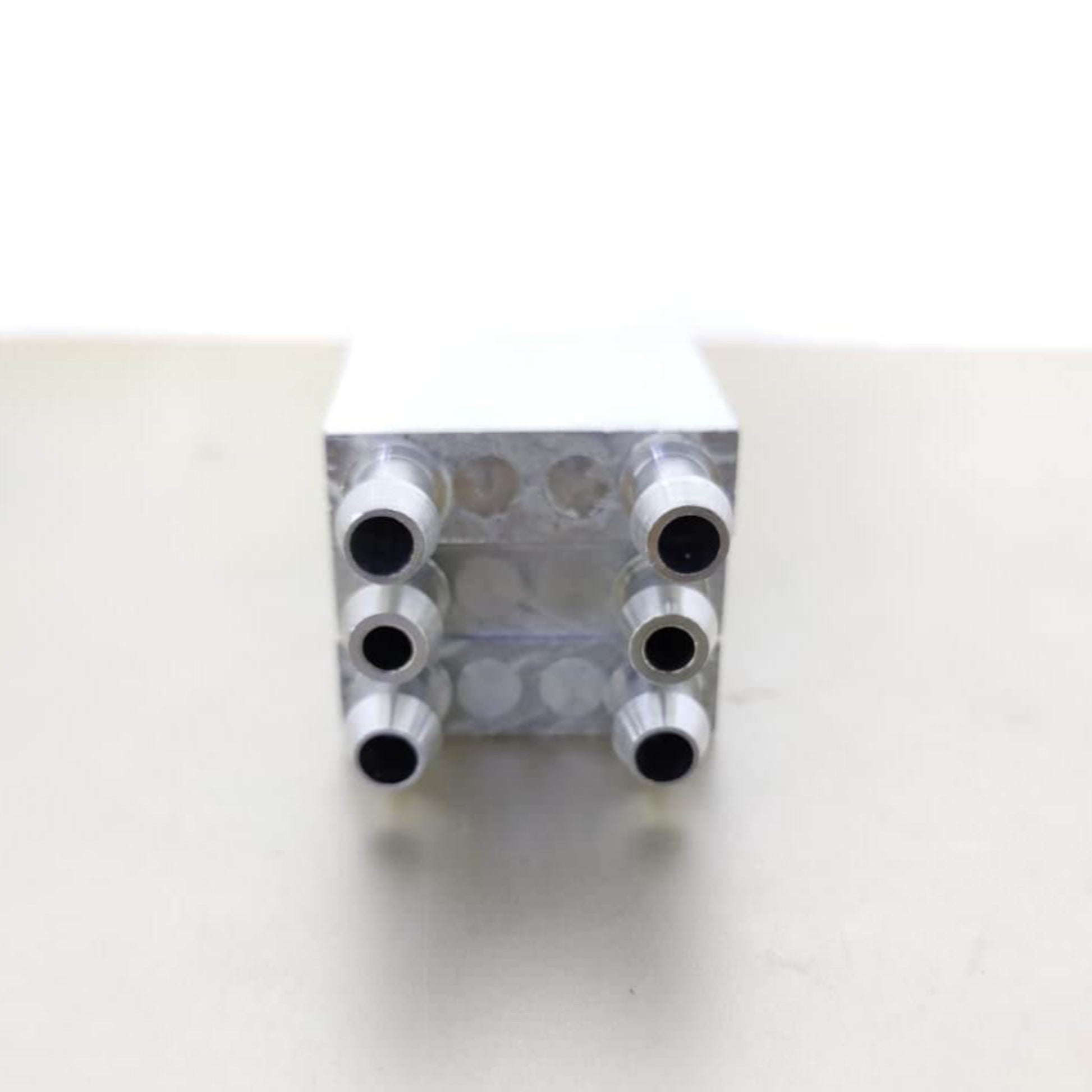 Aluminum water cooling block with multiple ports for CPU, GPU, and industrial applications, providing efficient heat dissipation.