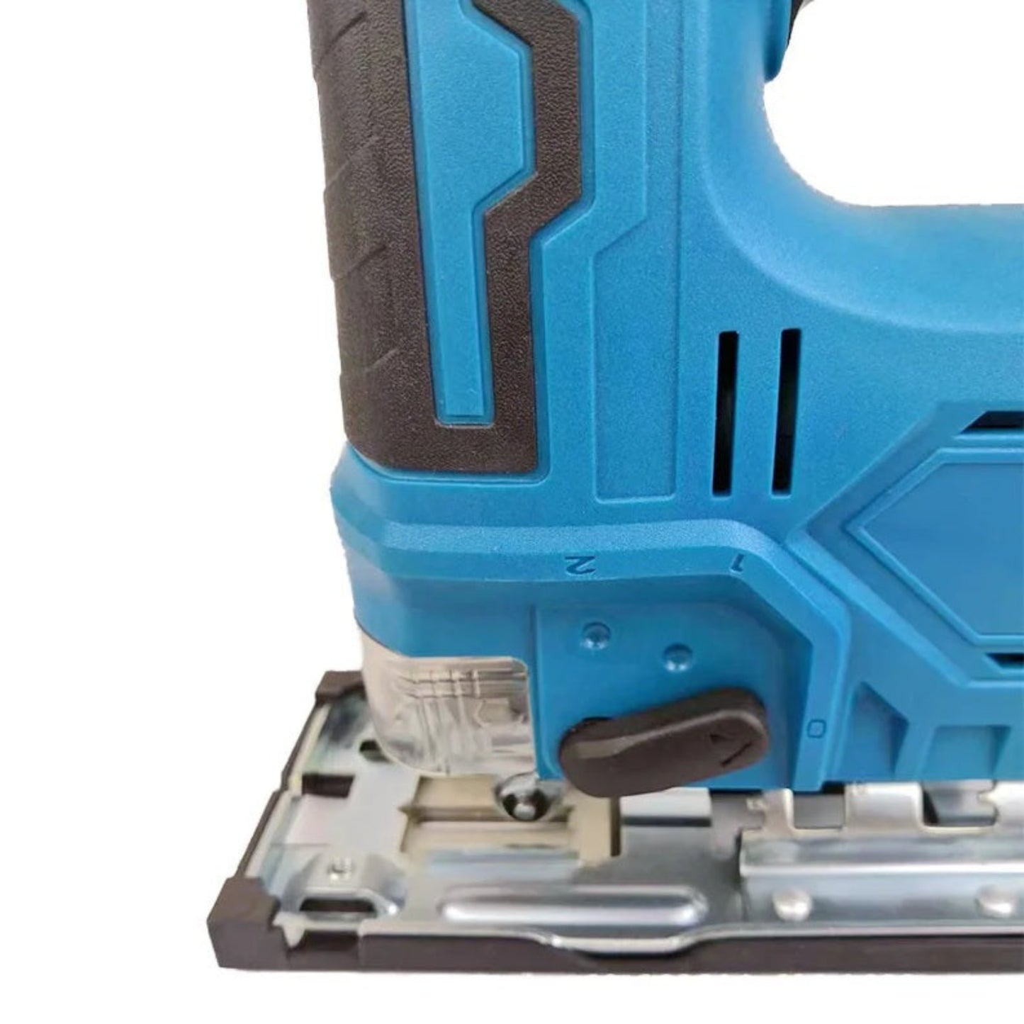 Close-up view of the black orbital setting adjustment lever on the side of the cordless jigsaw.