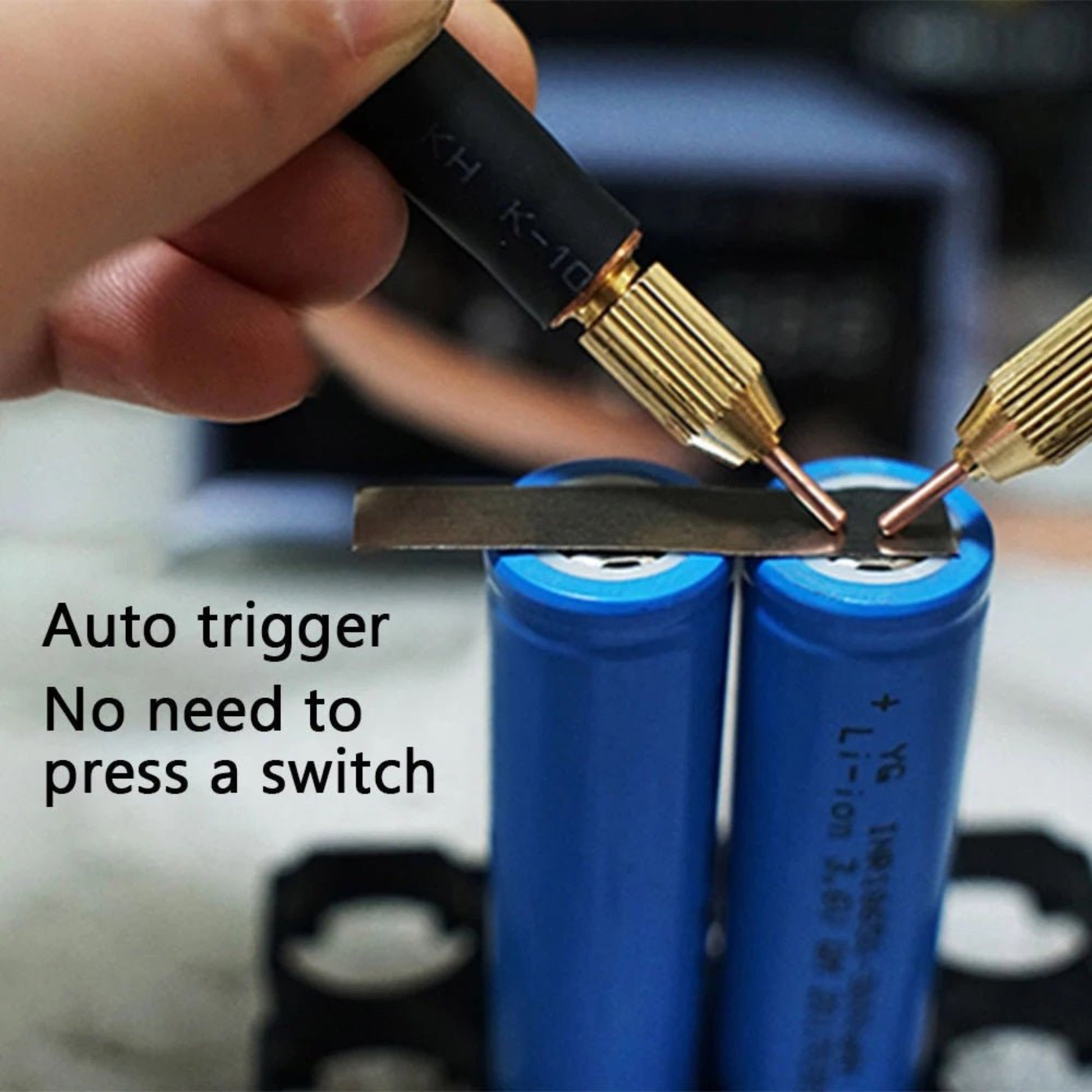 Auto trigger feature of a handheld spot welder welding two 18650 batteries without pressing a switch.