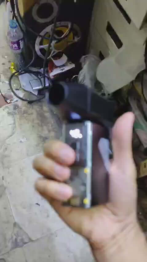 Hand holding a portable 130,000 RPM Mini Turbo Jet Fan, showcasing its compact design for dust removal and drying.