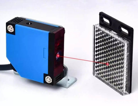 8m adjustable laser reflective photoelectric sensor with red laser beam and reflector for precise detection.