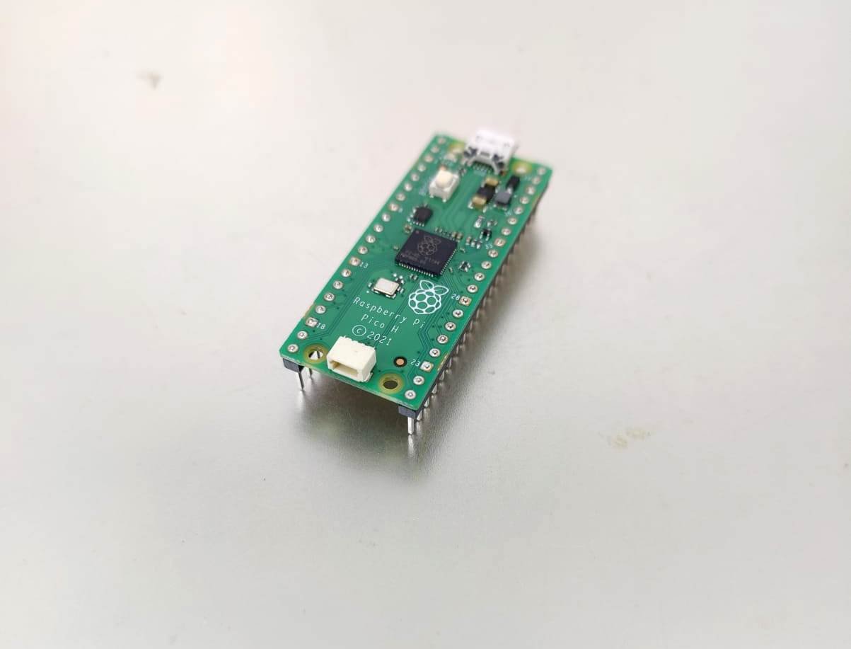 Raspberry Pi Pico H RP2040 microcontroller board with headers for electronics projects and development.