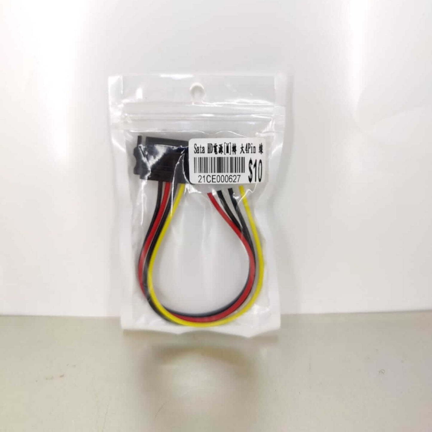 SATA to Molex power adapter cable in packaging, showing color-coded wires for compatibility.